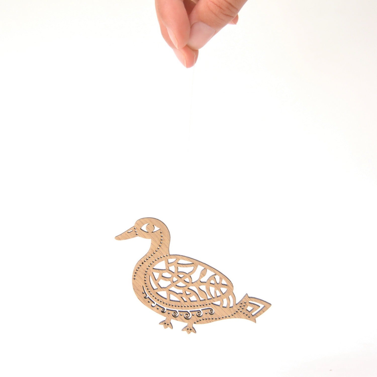 Pendant / magnet DUCK PLACES THE EGG OF THE UNIVERSE